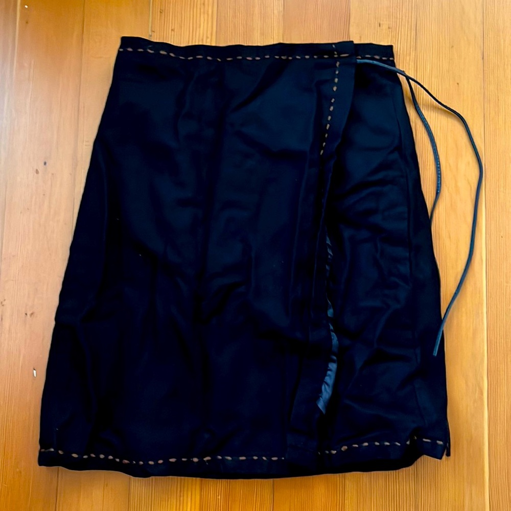 Black wrap skirt with stitch detail